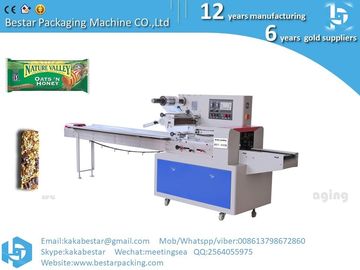 Quality Assurance Vertical Flow Packing Biscuit Cookie Candy Cheese Energy Chocolate Protein Granola Bar Packaging Machi supplier